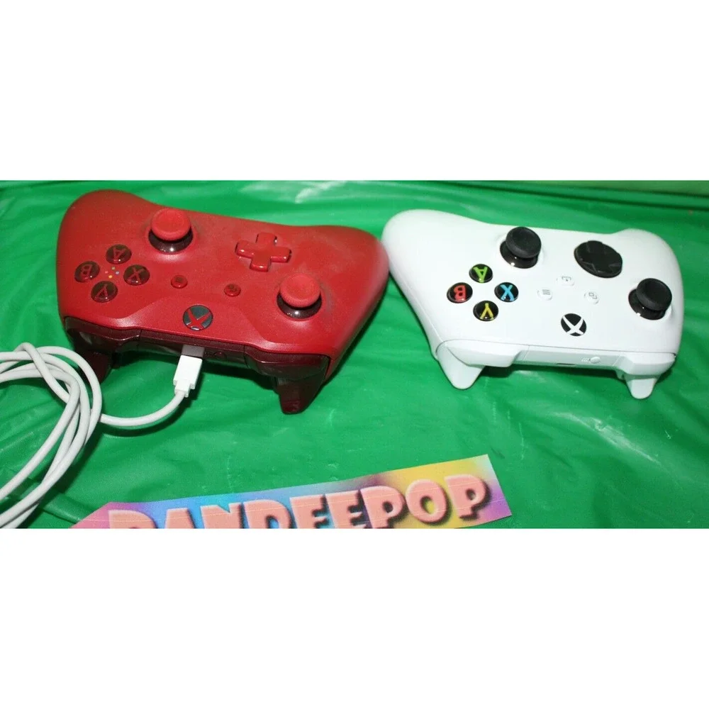 2 Microsoft Video Game Controllers Red 1708 And White 1914